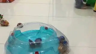 my first ever spin steal beyblade (I put some rubber bands on there to make it spin steal)