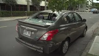 Cars parked near Zippy’s Vineyard left with shattered windows after a man threw rocks at them