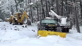 Backhoe Recovery- Glare ice!