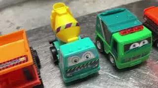 Construction car drive inside water. Excavator, Trash car, Mixer and another one. Car's diving