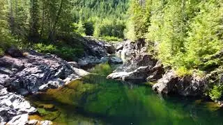 beautiful crystal clear waterfall drone shots HD