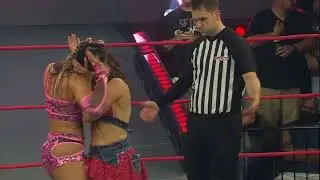 Mickie James and Chelsea Green Kissing each other 