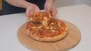 Cómo hacer una pizza que explote de queso
