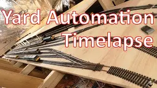 Timelapse recording of automated trains running for an hour around my loft layout