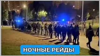 Dozens of masked members of the 