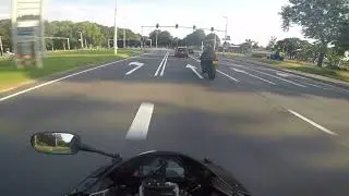 Car near hit motorcycle