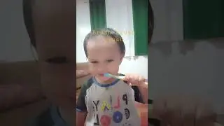 Baby brush her teeth for the first time