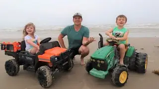 Using toy tractors to find hidden treasure on the beach | Tractors for kids