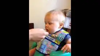 Baby eating limes