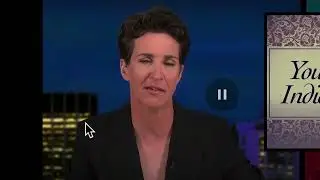 Even when she's smiling Rachel Maddow looks like she is gonna burst into tears