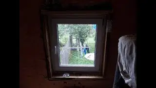 Installation of PVC Windows in the wooden house.