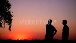 Stock Footage - Two Men At Sunset 2 | VideoHive