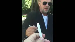 John Mellencamp signing autographs
