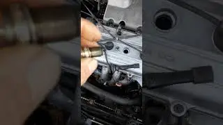 What should I do if I stripped the spark plug threads? 