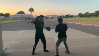 Karate Guy Hitting Boxing Mitts In Lompoc Valley Middle School (Date: unknown)