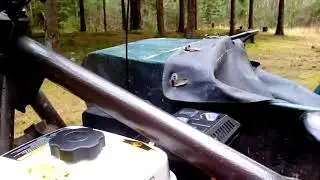 A Ural motorcycle with a 6.5 hp motor from a walk-behind tractor.