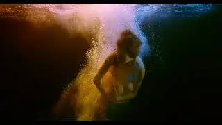 Underwater video shooting. A mermaid like in a fairy tale