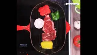 Стейк с овощами на сковороде гриль