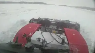 Два Кировца борются со снегом!