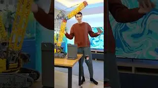 How much weight does the Lego crane lift?