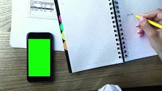 Iphone on table Green Screen Footage