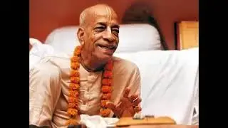 Srila Pabhupada chants the Hare Krishna mantra on a rosary