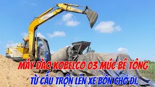 Máy đào KoBelco 03 múc bê tông từ cấu trộn lên xe bồn như thế nào?