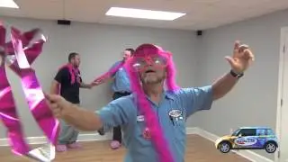 Pink shoe cover dance by Cooper's Heating & Air (Breast Cancer awareness)