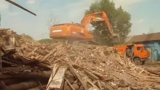 Asian excavator destroys old house - day 2