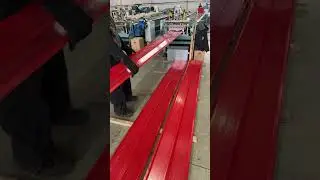Прокат металлического сайдинга Евро-Брус в красном цвете 