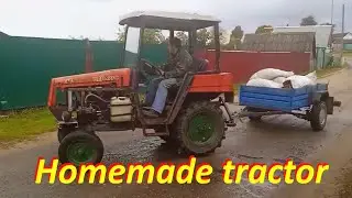Homemade tractor with internal combustion engine VAZ 2106 at work