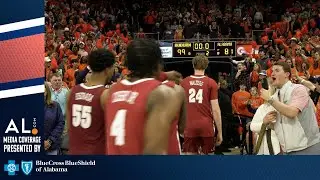 Auburn fans sing reverse Rammer Jammer after the Tigers beat Alabama 99-81 at Neville Arena