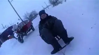 На санках за мотоциклом К750.
