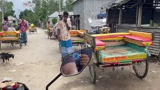 গ্রামীণ পথে একটি শান্ত নদী ও খেয়া পারাপারের দৃশ্য।