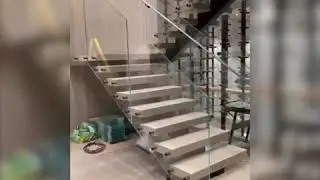 Modern Stairs and Glass Railings by Satkartar Glass Solutions