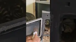 Glass cleaning hack with a damp tissue