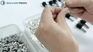 Overmolded grounding pin with plastic nut