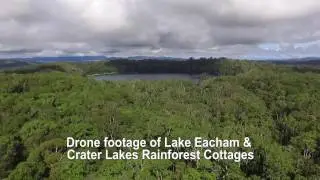 Drone overview of Lake Eacham and Crater Lakes Rainforest Cottages