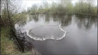 Fishing with a 6m casting net on a small river. More and more fish. Casting in slow mo.