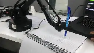 Writing using robotic arm