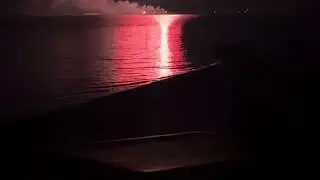 Firework reflections on water