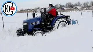 ЗАМЕЛО!!! Пробиваю дорогу, вывожу снег! Трактор глохнет. Запарафинилась солярка!!!