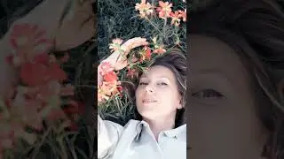 Creative portrait in spring field flower blossoms. DFW photography