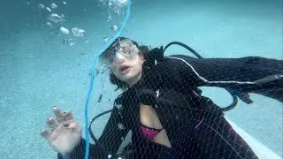 Scuba Girl Drowns Under Fishnet