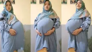 Beautiful hijab mother is 9 months pregnant with twins