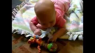 small baby playing