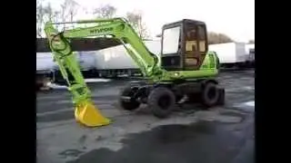 экскаватор колесный HYUNDAI ROBEX 555WM
