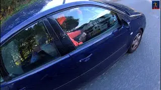 Polo Driver Holding his Phone in Traffic - LM02 YMO