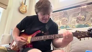 How to Play Guitar Behind Your Head
