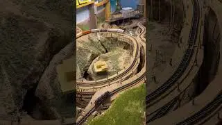 Freight Train Reaches Summit of Colorado Mountain 5 Level Helix N Scale Model Trains in Action